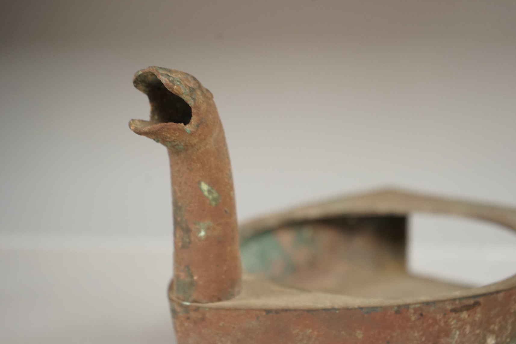 A Chinese bronze zoomorphic stove, Han Dynasty, 21cm long. Condition - fair